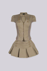 Deep V neckline with an open front top with front zipper closure and metallic buttons