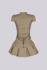Deep V neckline with an open front top with front zipper closure and metallic buttons