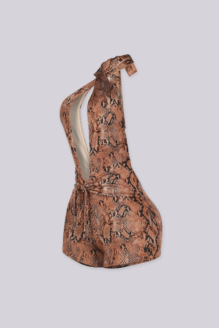 Snake print halter neck romper with deep plunge V neckline