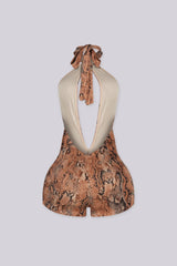 Snake print halter neck romper with deep plunge V neckline
