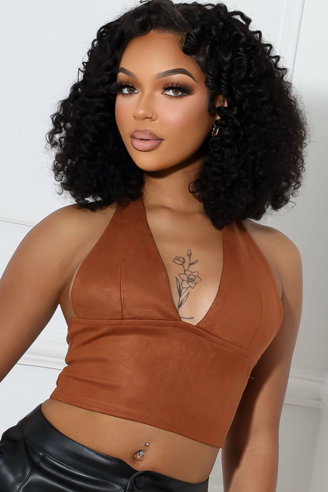 Soft suede cropped halter top featuring deep V neckline with a self tie closure