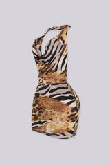 Animal print halter mini dress featuring a draped cowl neckline, Open back detailed with a vertical O ring chain