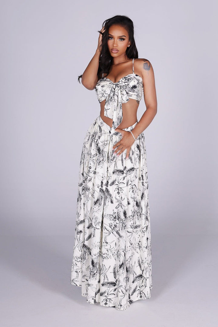 Floral sketch print bra top with front tie and smocked back, Flowy high-waist midi skirt with elastic waistband
