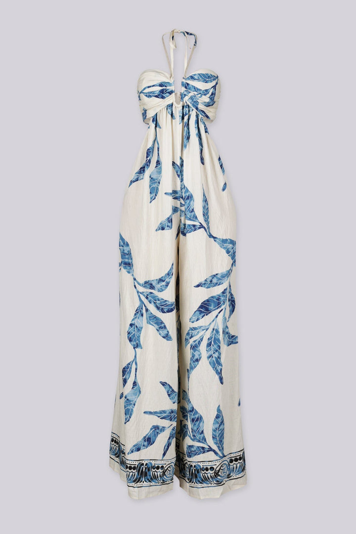 Blue leaf print wide leg halter jumpsuit featuring gathered center bust detail with deep plunge notch
Side waist cut out with smocked back detail