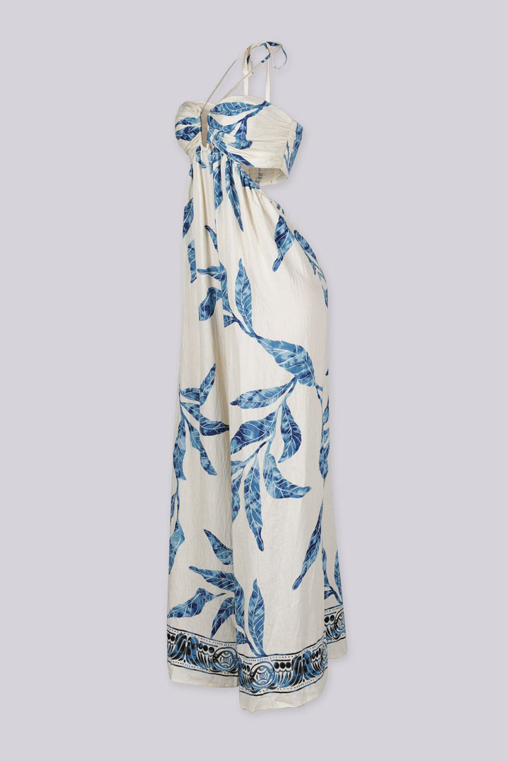 Blue leaf print wide leg halter jumpsuit featuring gathered center bust detail with deep plunge notch
Side waist cut out with smocked back detail