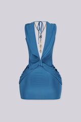 EDGEBYKS - Plunging V neckline with a sculpted twist knot detail at the waist, teal back view
