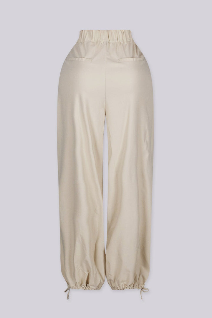 EDGEBYKS - Relaxed wide leg pants with deep inverted pleats at the high waist, bone back view