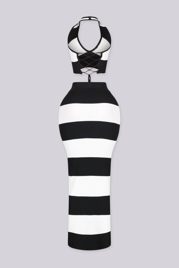 Striped ribbed knit halter crop top with a lace up back closure, black back view.