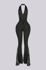 EDGEBKS - Ribbed knit fitted halter jumpsuit with a plunging V neckline and open low back, back view