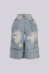 EDGEBYKS - High rise wide leg bermuda denim shorts with distressed rips and frayed patches, back view