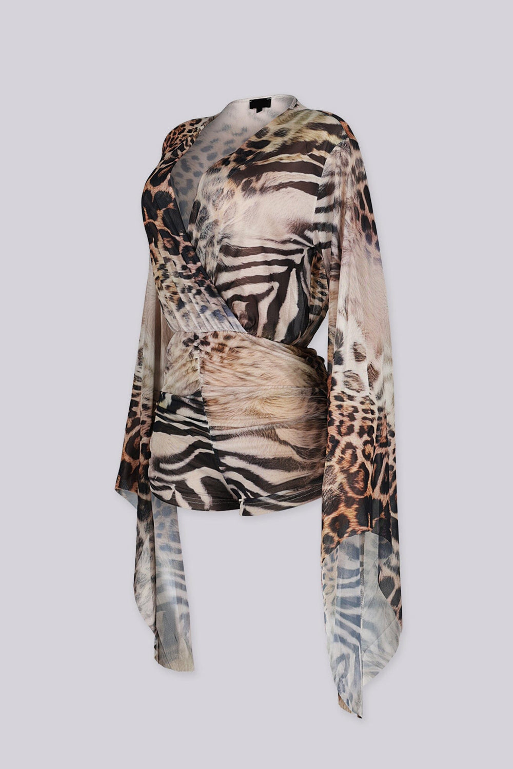 EDGEBYKS - Sheer mesh long sleeve romper with deep plunging neckline featuring a mixed animal print, side view