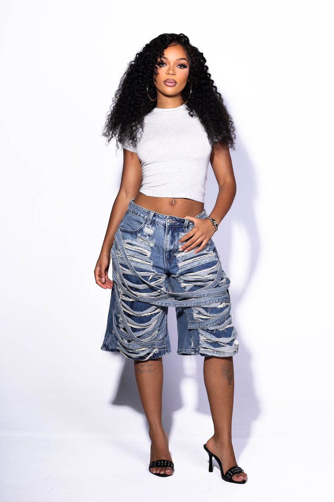 EDGEBYKS - Distressed denim shorts featuring extreme cutout ripped detailing throughout, back view