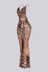 EDGEBYKS - Mixed animal print mesh jumpsuit featuring plunging surplice wrap with tie waist, side view.