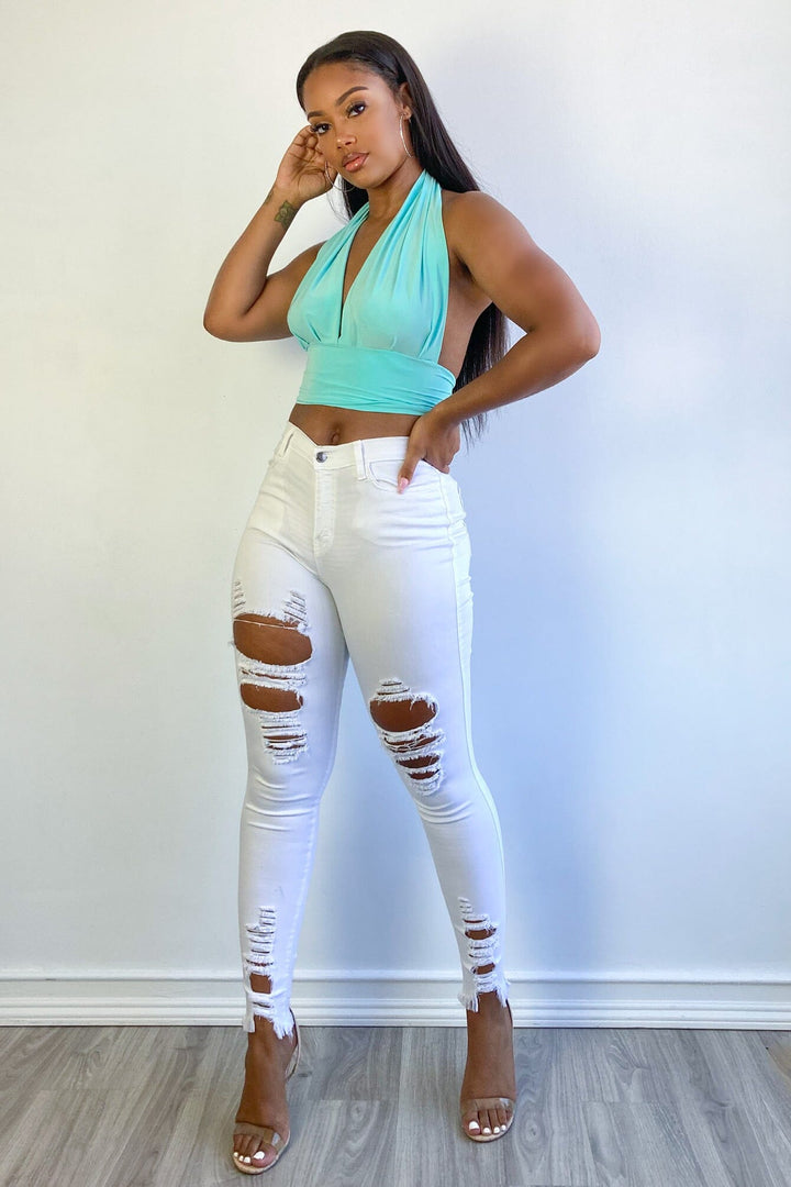 Distressed high waist white jeans
Skinny leg fits