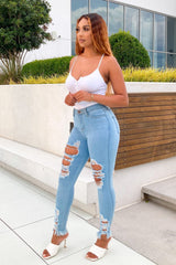 knit bodysuit with thin adjustable spaghetti straps and a scoop neckline
