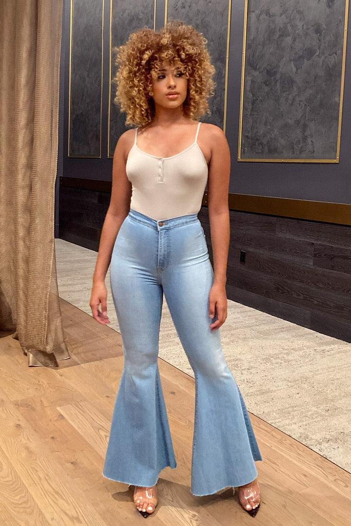 knit bodysuit with thin adjustable spaghetti straps and a scoop neckline